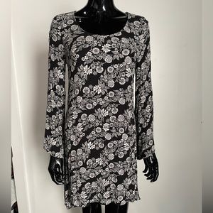 Black long sleeve tunic style flowy white floral print dress